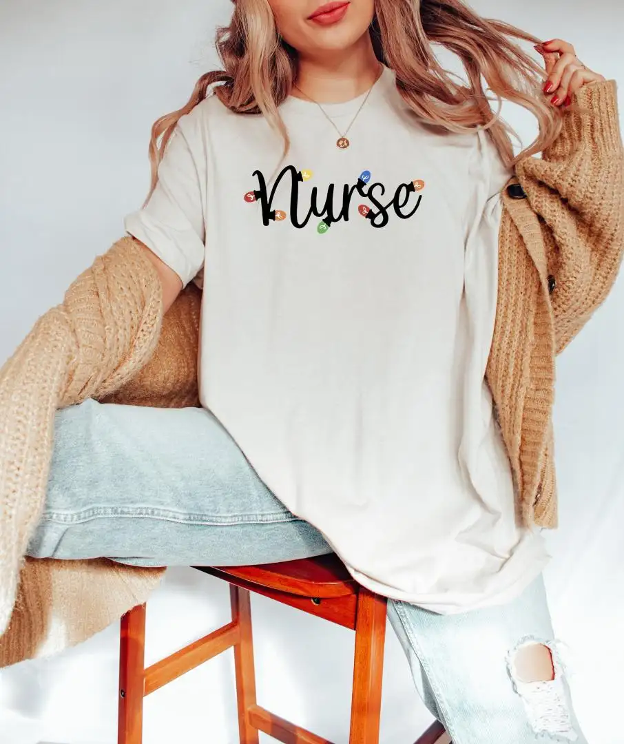 Christmas Lights Nurse Shirt / Christmas Nursing Sweater / Emergency Nurse Shirt / Gift For Nurse / Nursing School T-shirt