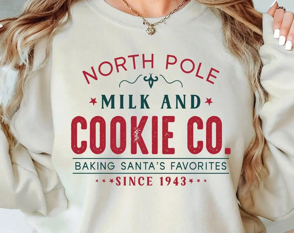 North Pole Milk And Cookie Co. Baking Santa’s Favorites Since 1943 Shirt, North Pole Christmas Sweatshirt, Funny Christmas North Pole Tees