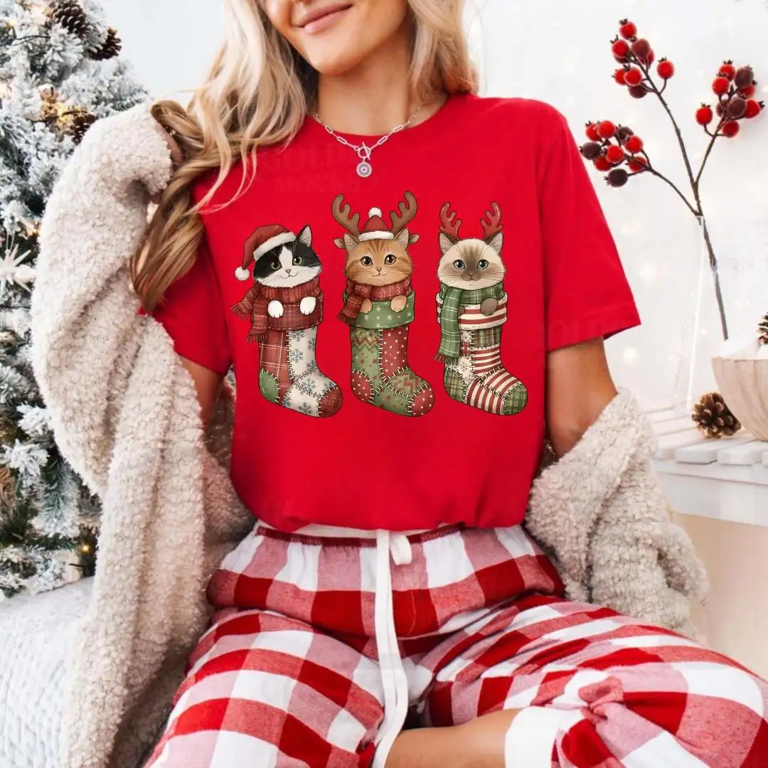 Christmas Kittie Shirt, Cat Lover Holiday Tee, Festive Kitty Graphic Top, Cat Mom Gift, Cats in Stockings T-Shirt, Cozy Winter Cat Shirt